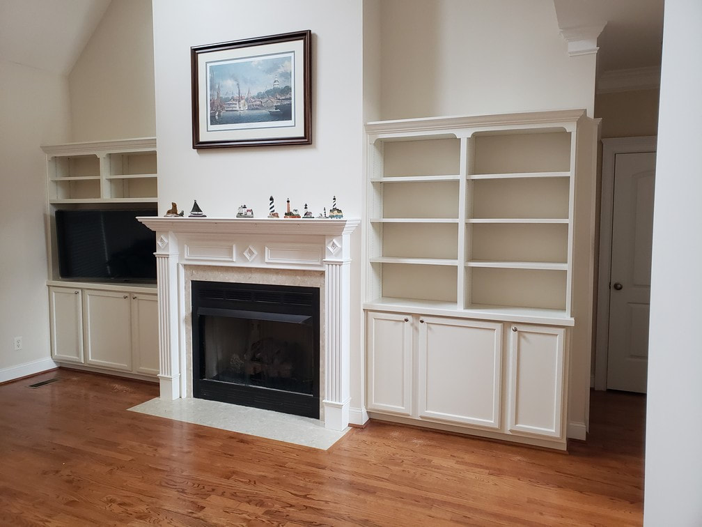 Cabinets and shelving built, installed, and painted in this living room.